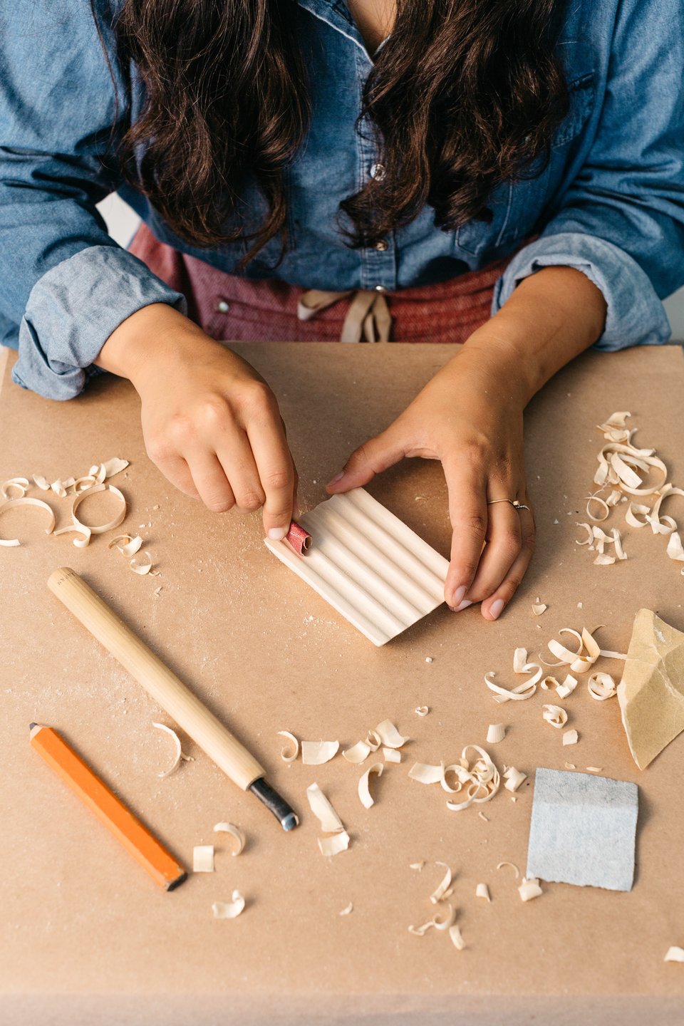 Person sanding Soap Dish Blank