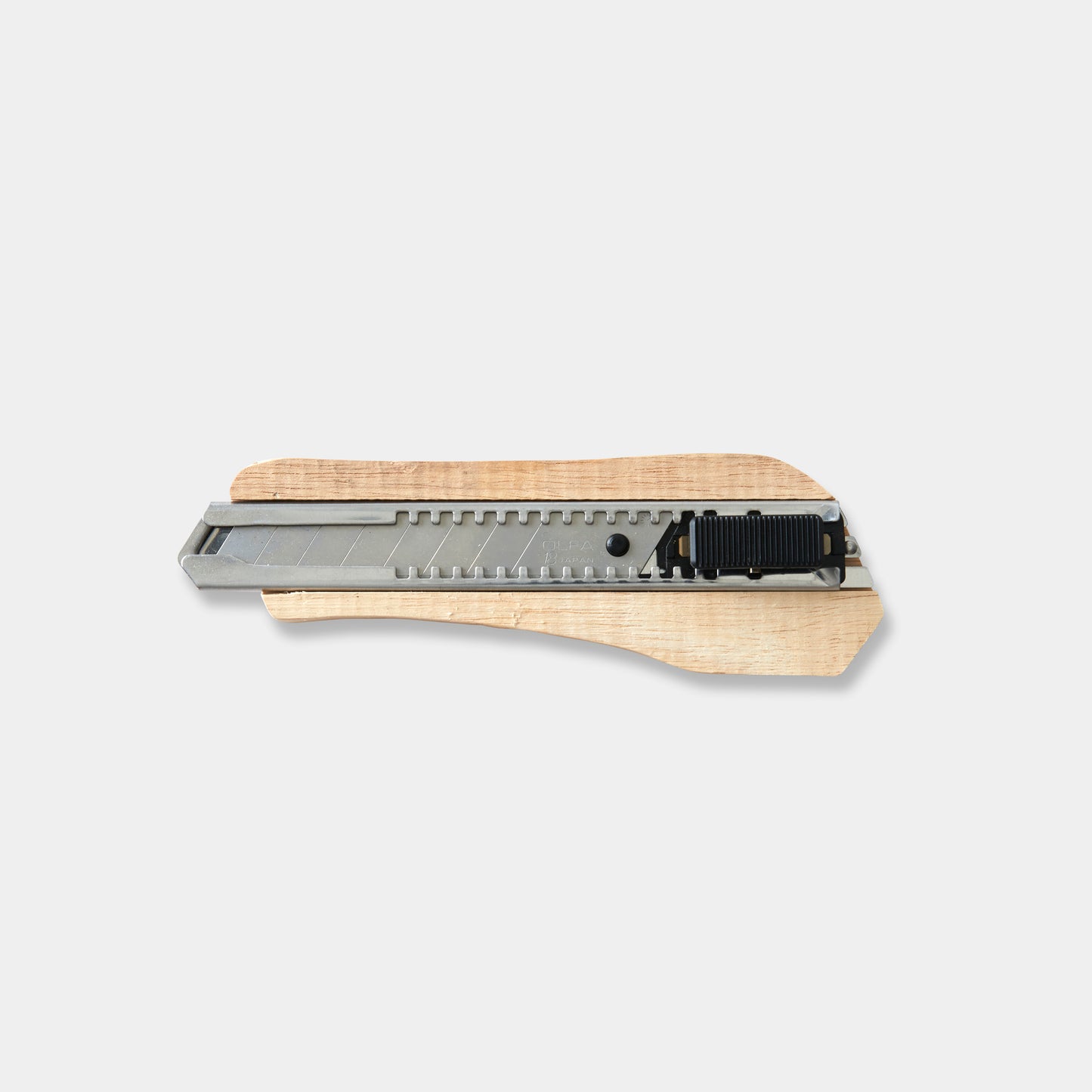 Unfinished example of utility knife carving blank.
