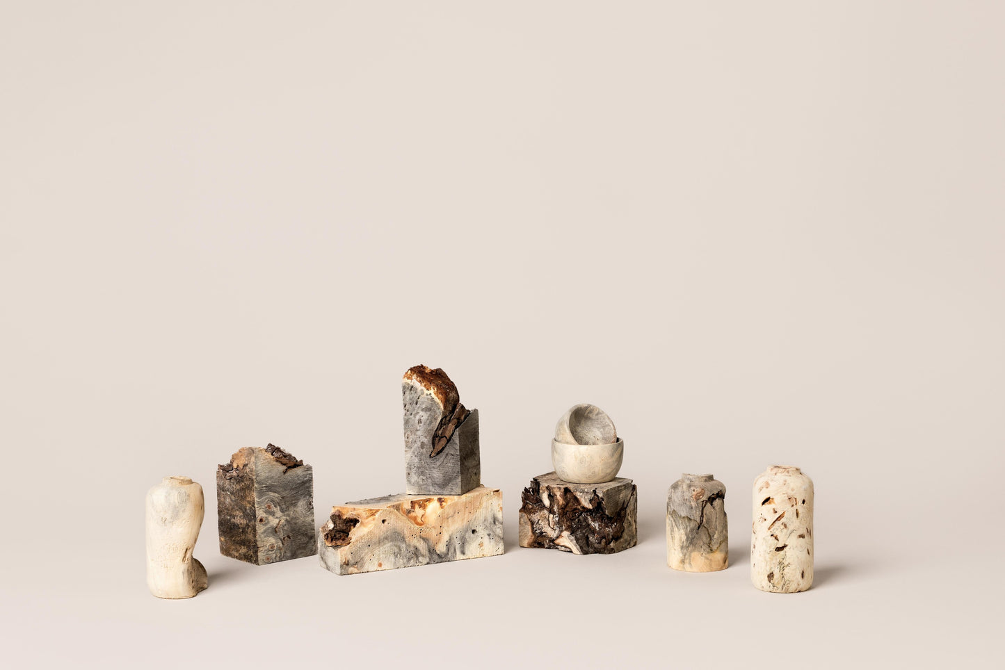 Buckeye Burl Vases shown in different shapes and designs.