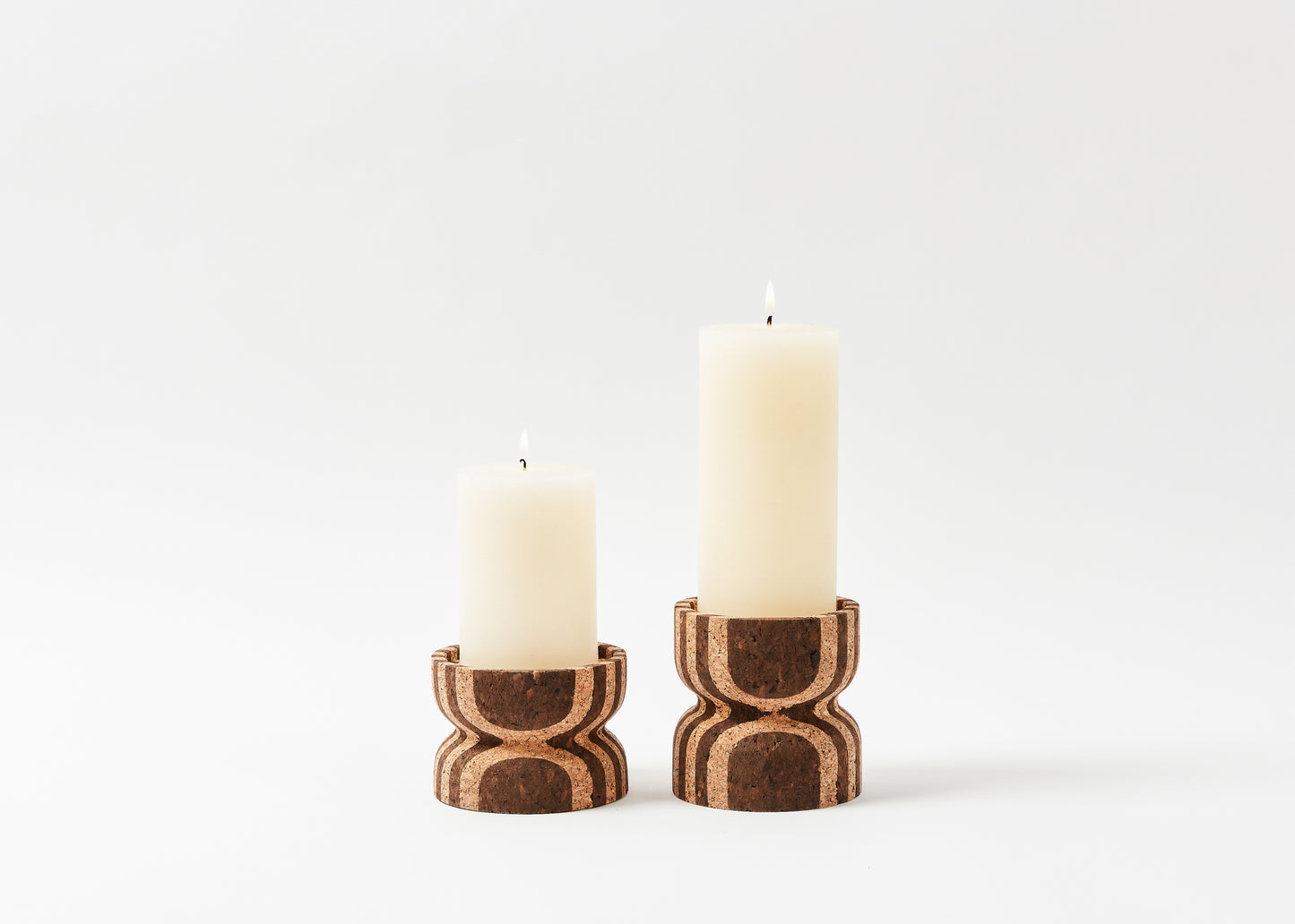 Anni Medium Striped Cork Candle Holder shown next to smaller striped cork candle holder.