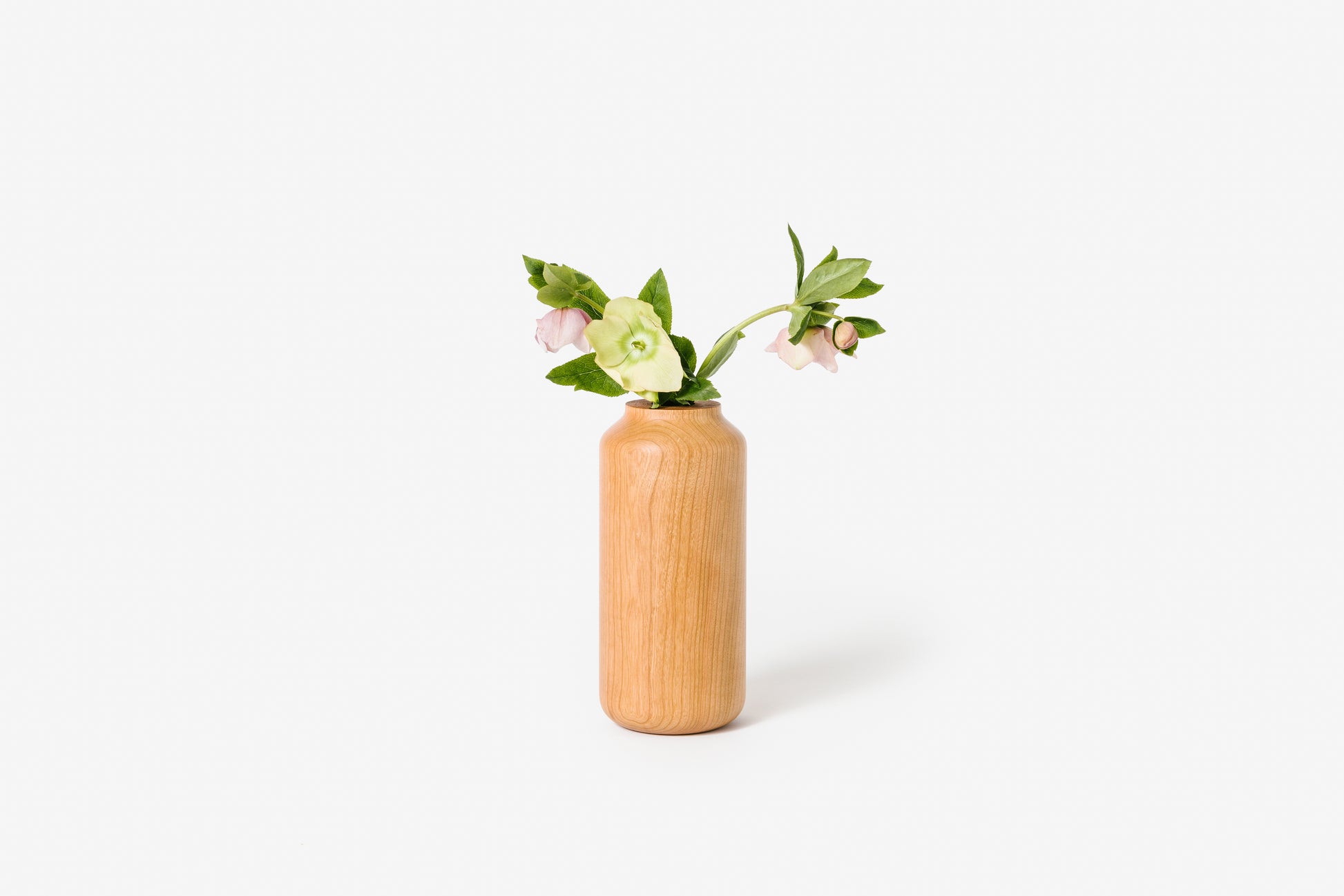 Cherry tall & wide vase with large flowers. Hand-turned solid wood. By Melanie Abrantes Designs.