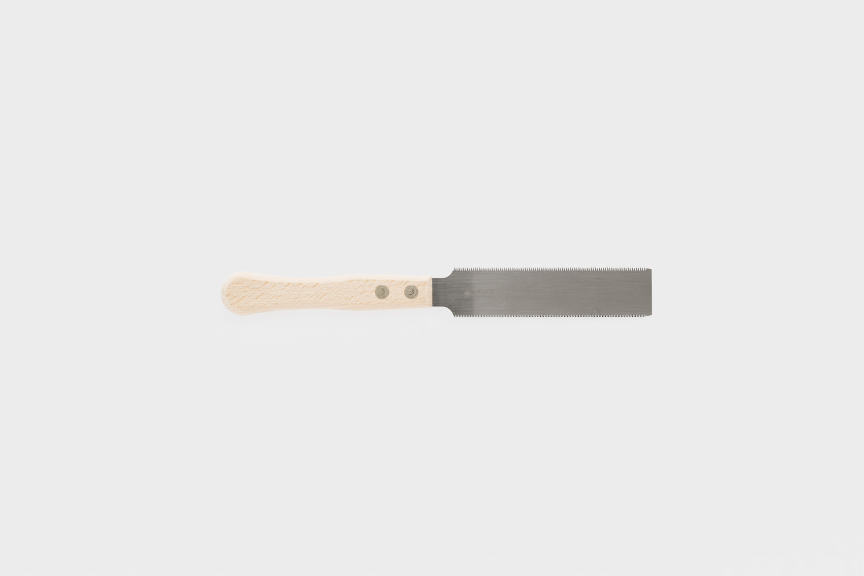 Japanese Double-Sided Flush Cut Saw with each side of the blade showing different sizes of teeth.