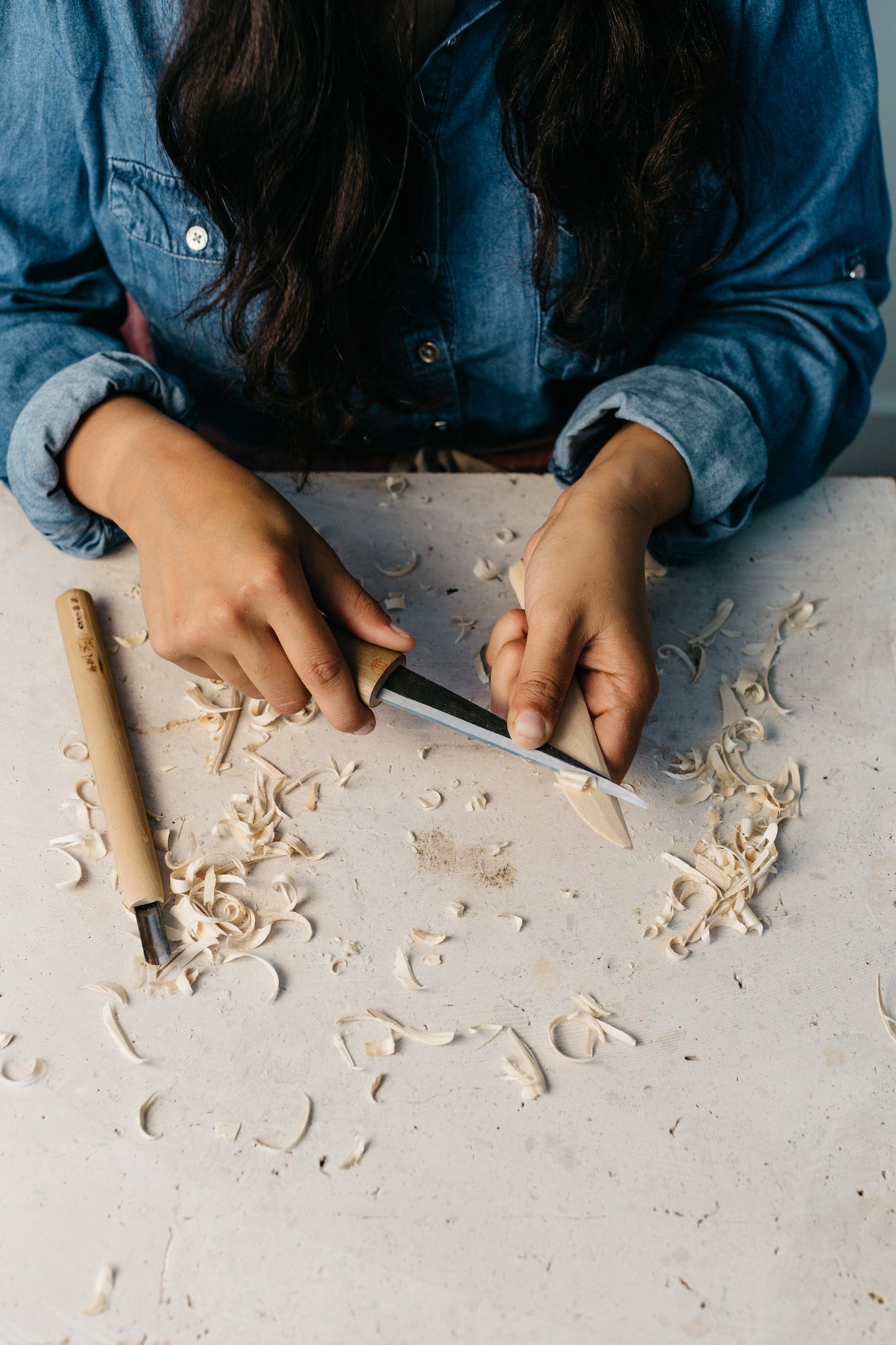 Whittling a poplar wood butter knife blank.