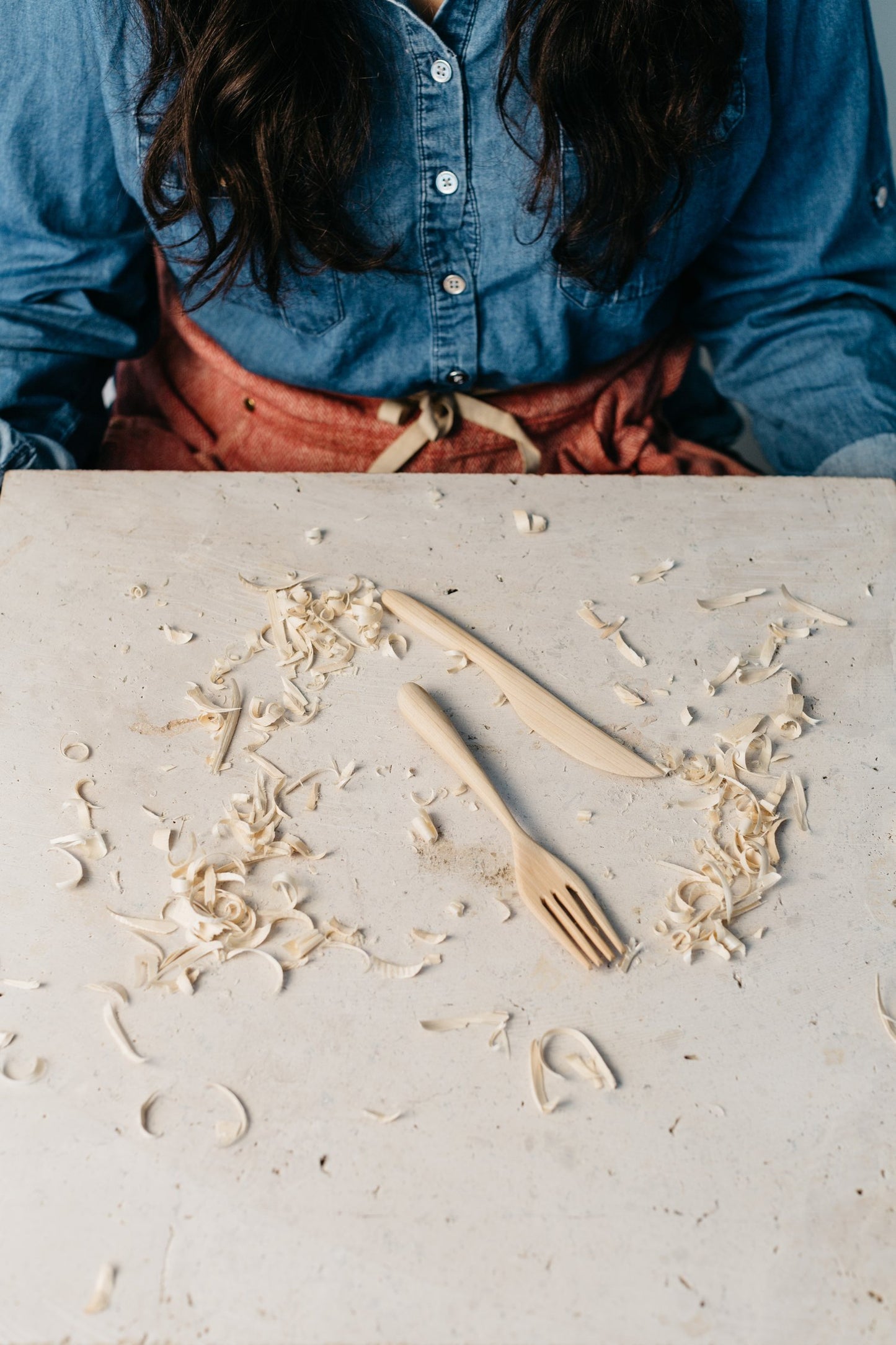 Final product shown of knife and fork to carve.