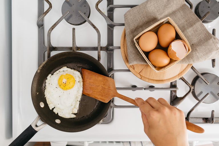Spatula blank being used to cook eggs.
