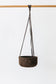 Large charcoal cork hanging planter by Melanie Abrantes Designs. Shown hanging