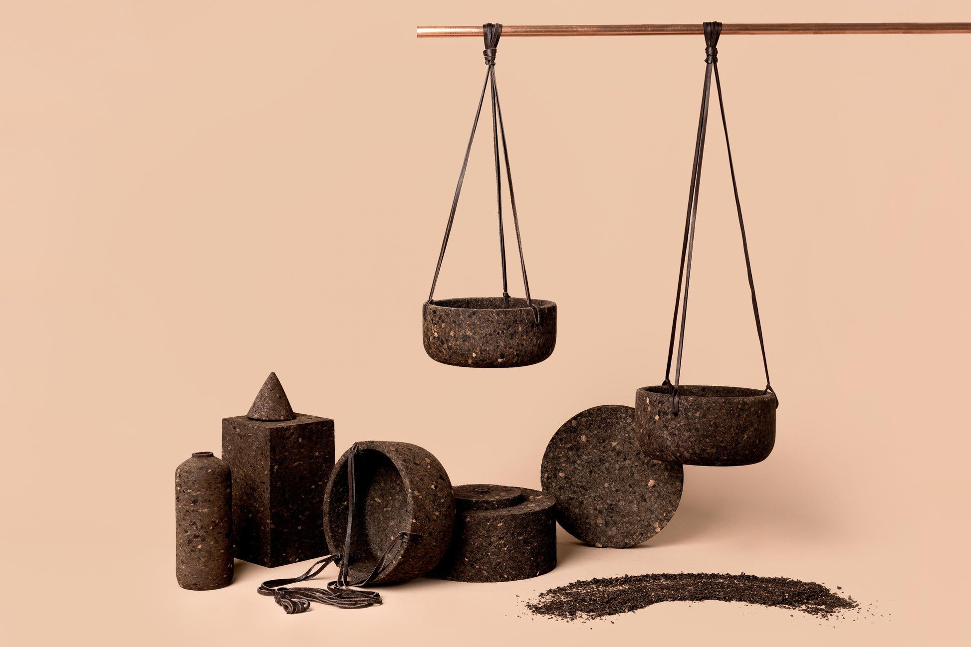 Charcoal cork hanging planters shown with the tall cork vase.