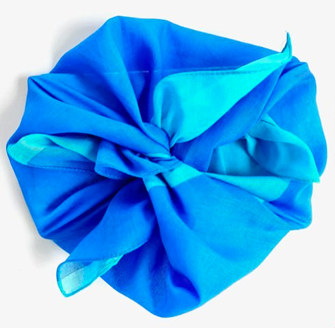 Arial view of the periwinkle/aqua cloth wrapped with knot on top.