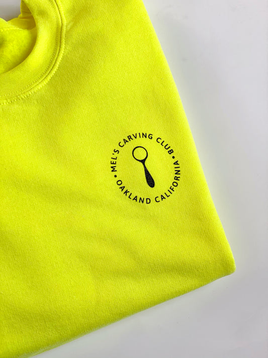 Neon Yellow Mel's Carving Club Sweatshirt with Logo on Chest | Melanie Abrantes Designs