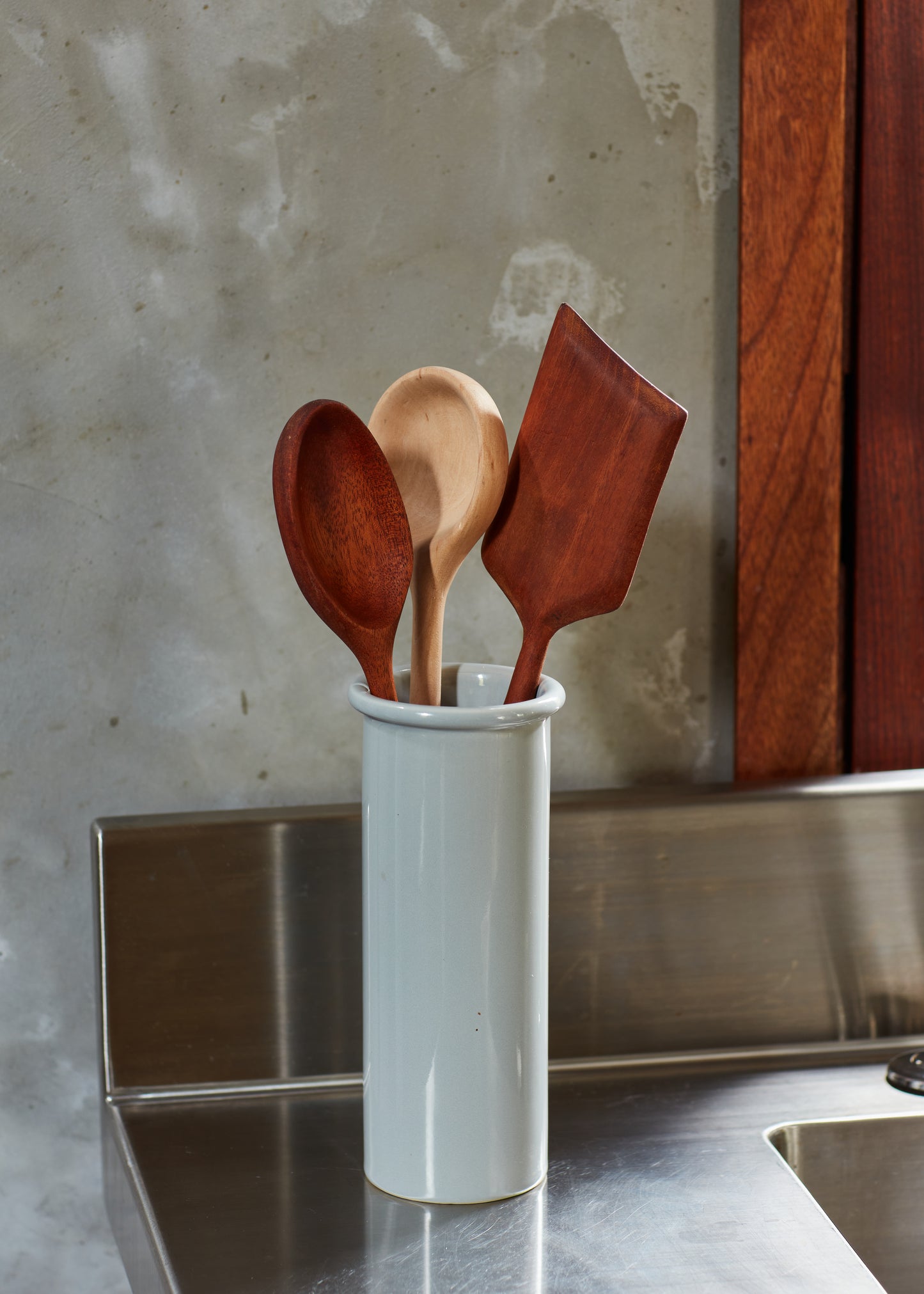 Cooking spoons and spatula shown as finished products in a holder on a counter | Melanie Abrantes Designs