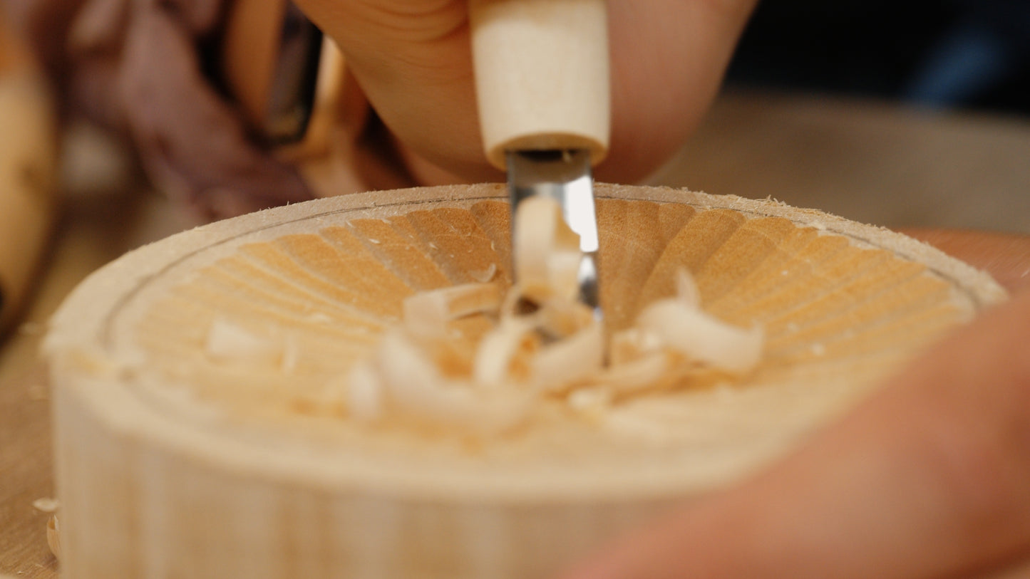 Carving the top of the bowl with a spoon gouge. Tutorial will teach you how to hold the tools as well as whittling techniques.