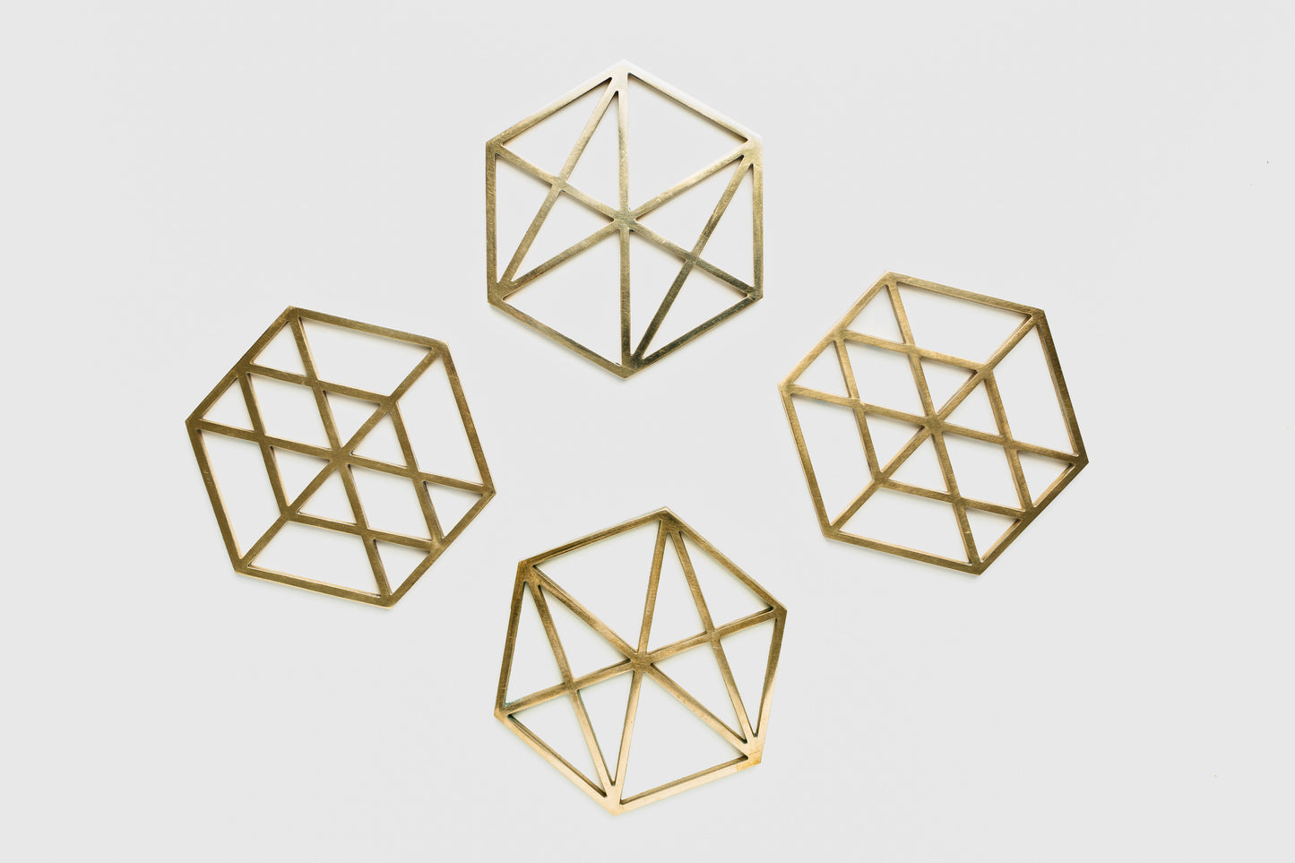 Brass trivets inspired by Bauhaus 