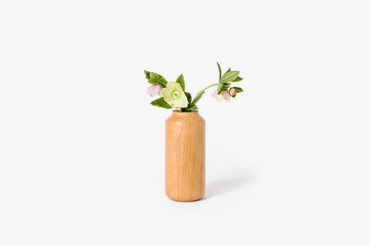 Cherry tall & wide vase with large flowers. Hand-turned solid wood. By Melanie Abrantes Designs.
