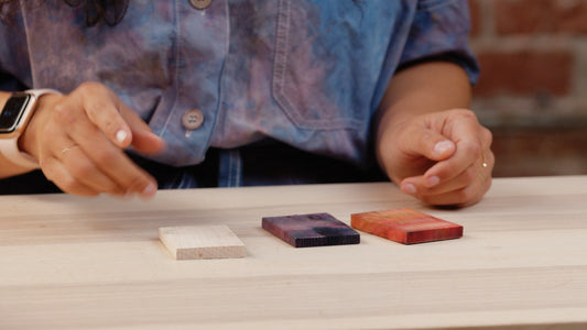 Wooden samples shown on a table to test the dying process before you dye the vase. By Melanie Abrantes Designs.