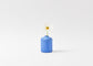 Hand painted bud vase in cobalt blue with a white flower inside the vase. By Melanie Abrantes Designs