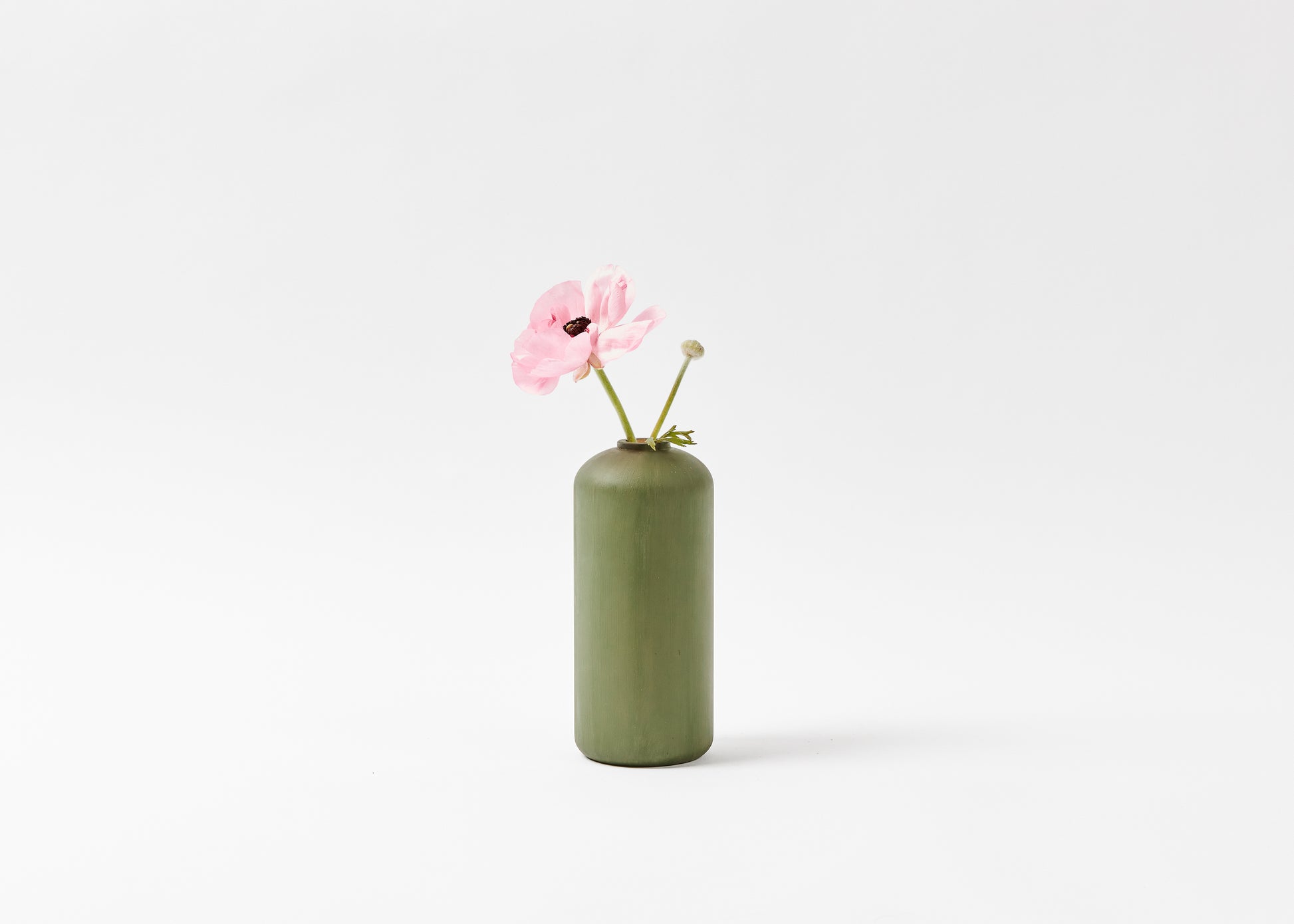 Tall vase in sage green with pink flower in vase. Hand painted | Melanie Abrantes Designs.