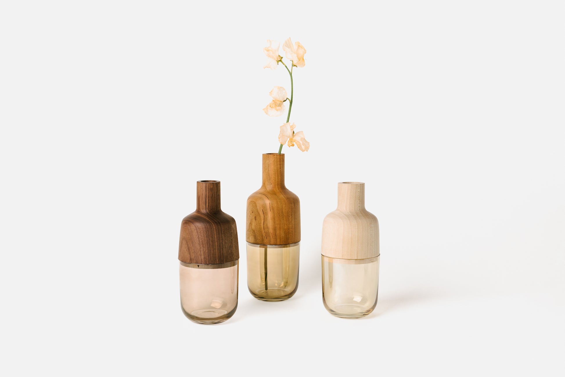 Hardwood and glass Marais Vases. From left to right: Indira, Maya, Greta | Melanie Abrantes Designs