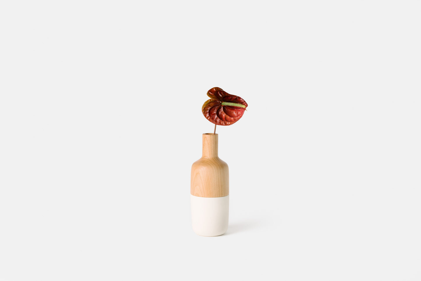 Cherry and white ceramic marais vase by Melanie Abrantes Designs.