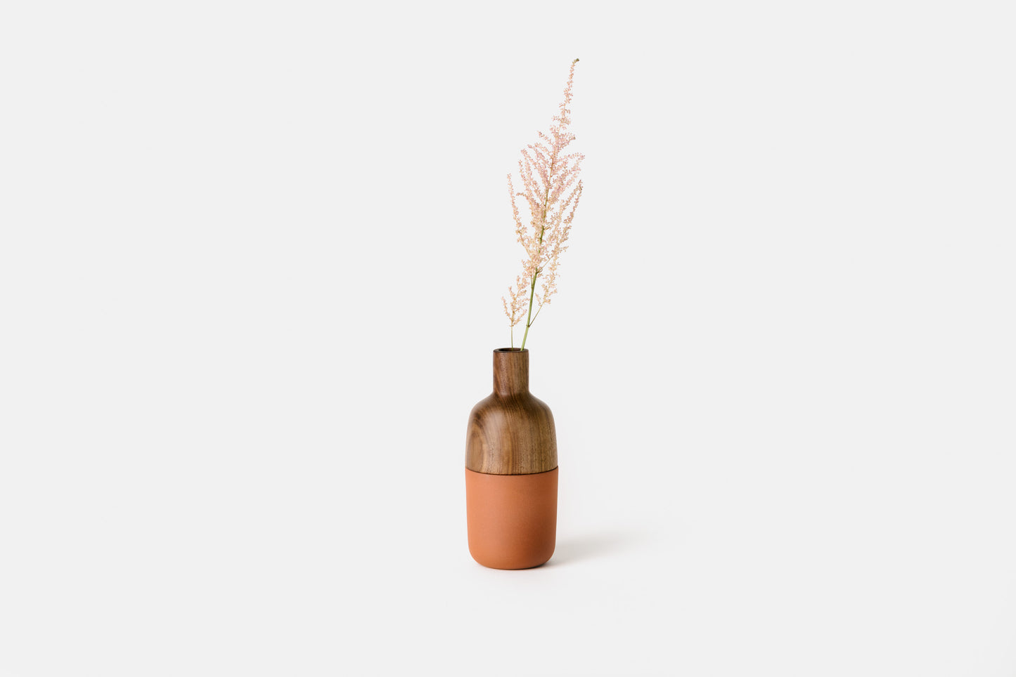 Walnut and terracotta marais vase by Melanie Abrantes Designs.