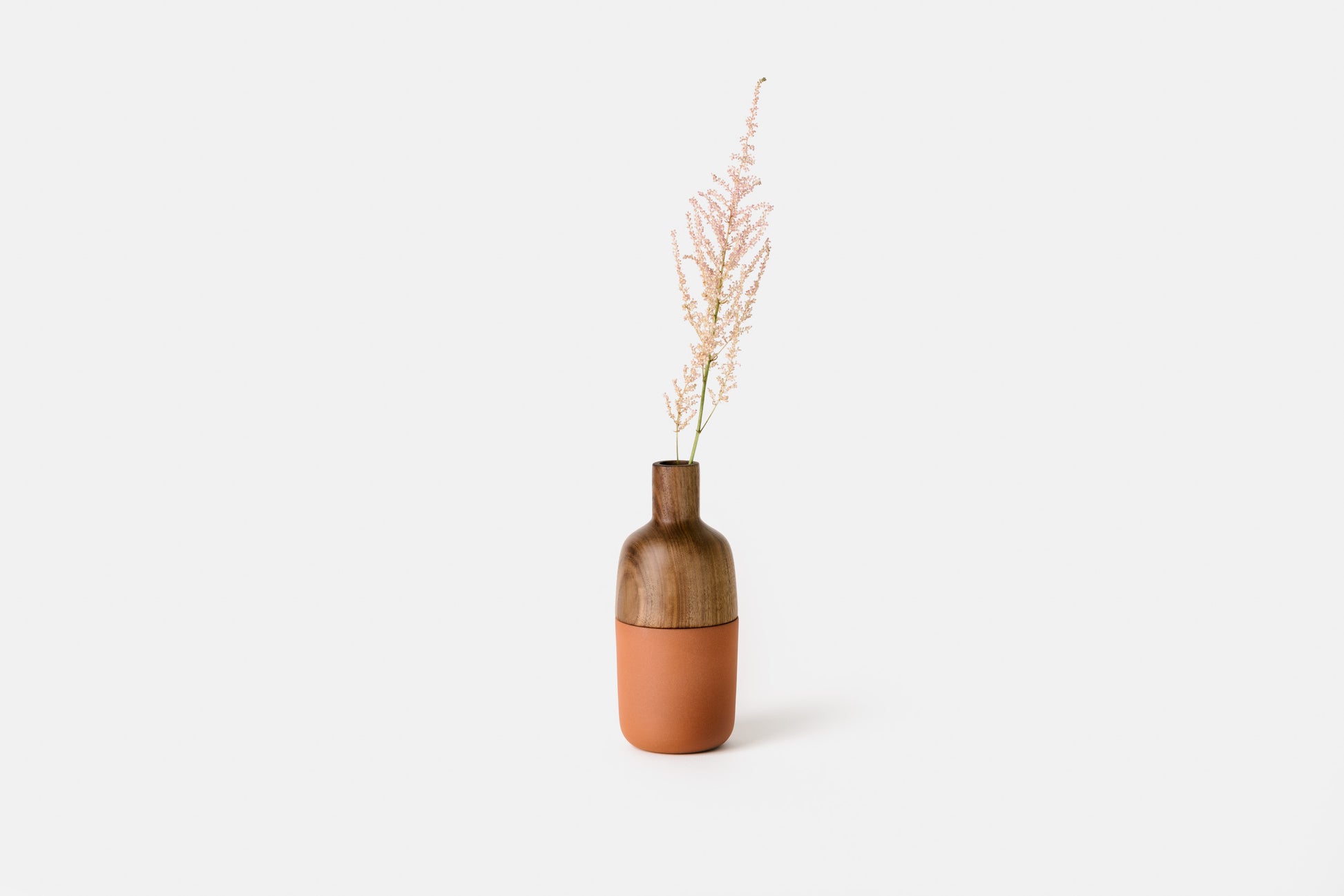 Walnut and terracotta marais vase by Melanie Abrantes Designs.