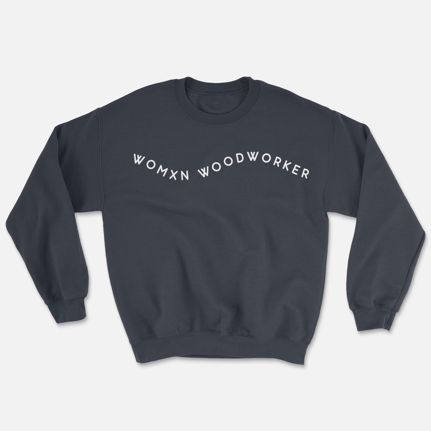 Heather grey crew neck sweatshirt. Reads "Womxn Woodworker" in white font.